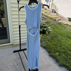 Women's light blue, ribbed midi dress with a distinctive side cut-out at the waist