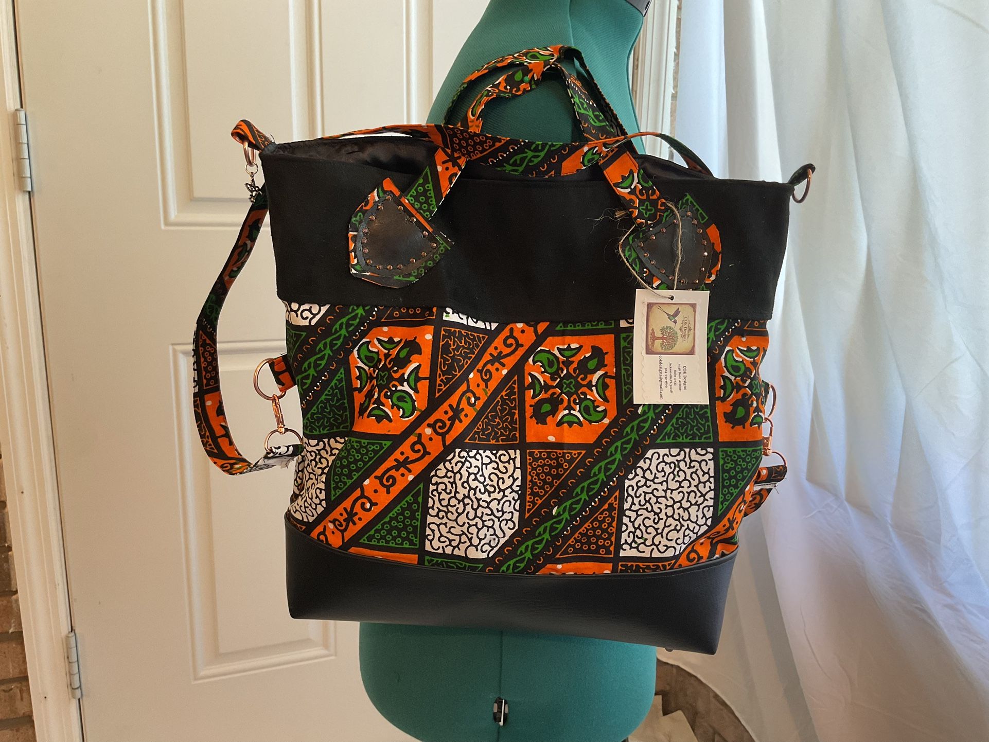 Fabunni Silver Tote Bag: A Celebration Of Artistry and Jamaican Culture