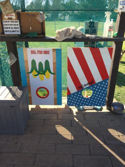 2 Decorated Solid Wood Corn Toss Boards.