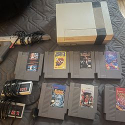 Nintendo Console With Controllers, Zapper And Assorted Games 