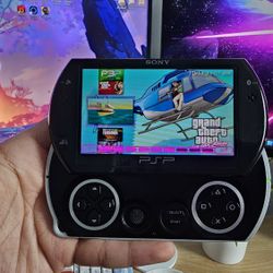 Sony PSP Go black with 64GB of games and charger