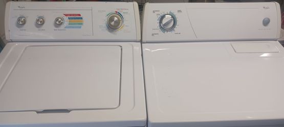 White Whirlpool Washer and Electric Dryer Set.