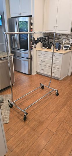Rolling clothing racks
