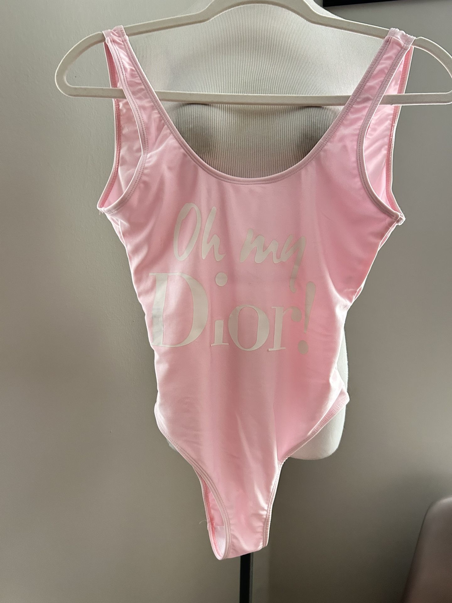 We Man’s Size Small Pink And White One piece 🏊 