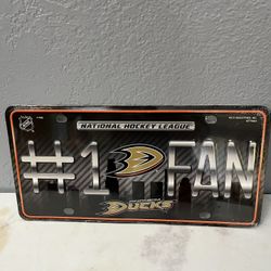 Anaheim Ducks License Plate #1 Fan.  Made of Metal.  Brand new sealed in plastic. 