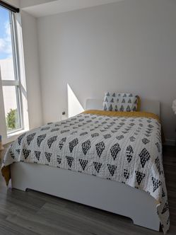 IKEA brand. Full size bed with mattress.