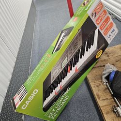 Casio LK-165 61 Key Portable Keyboard Casio LK-165 Key Lighting Keyboard. 