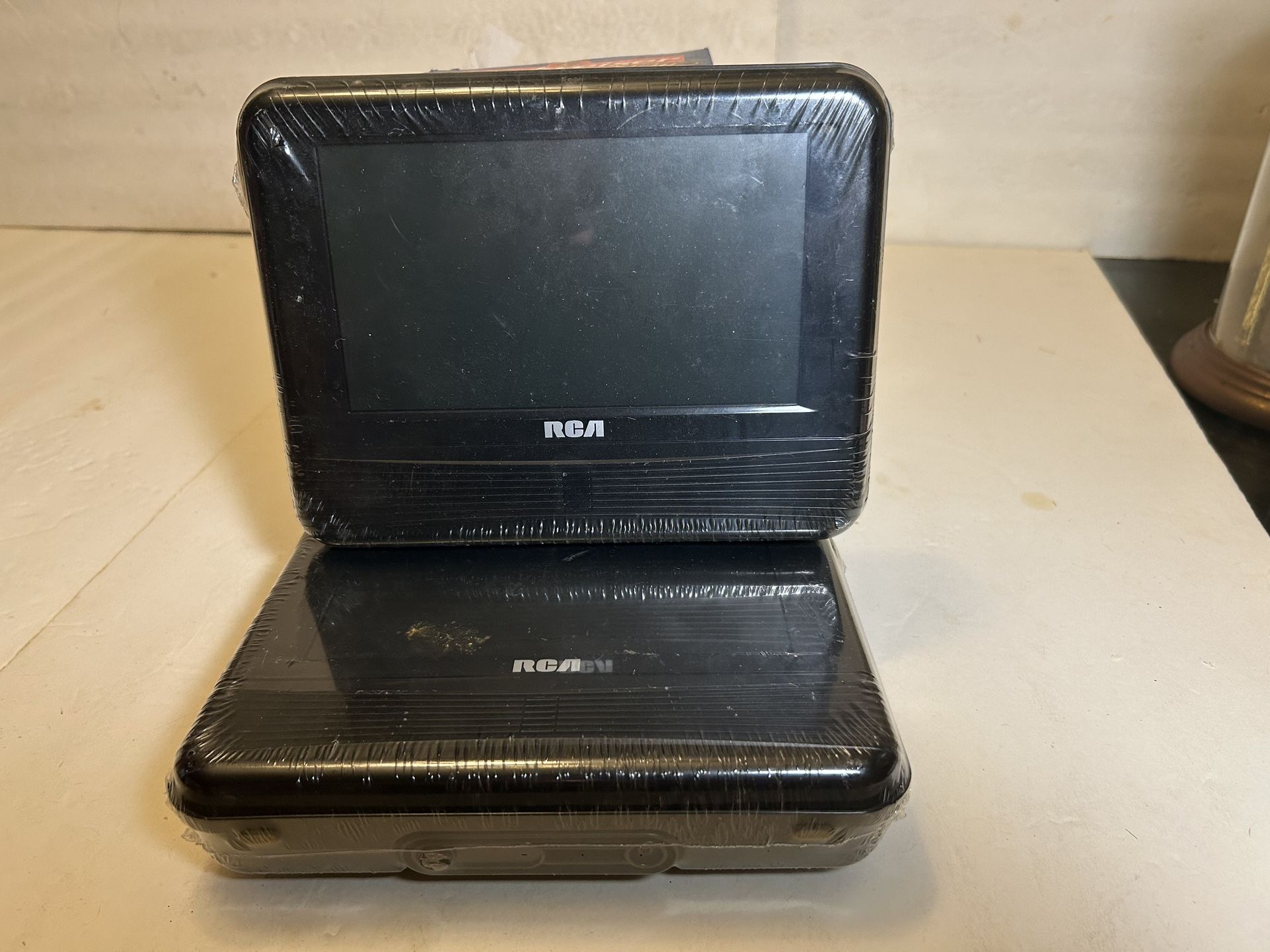 RCA 7” Dual Screen Mobile DVD/Video Game System Brand New Sealed DRC69705