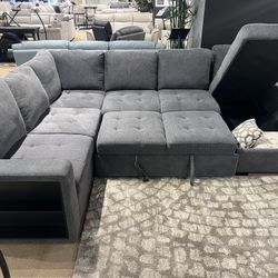 New Sectional W Pullout Bed/Chaise Storage.  Grey Or Beige.  128x99Dx40H.  Free Delivery!