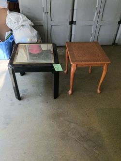 Two end tables one glass and other wood