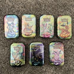 Prismatic Tins Lot 7 (**missing Vaporeon**)
