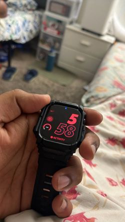 Apple Watch series 11 gps with spigen Black Rugged Armor Case
