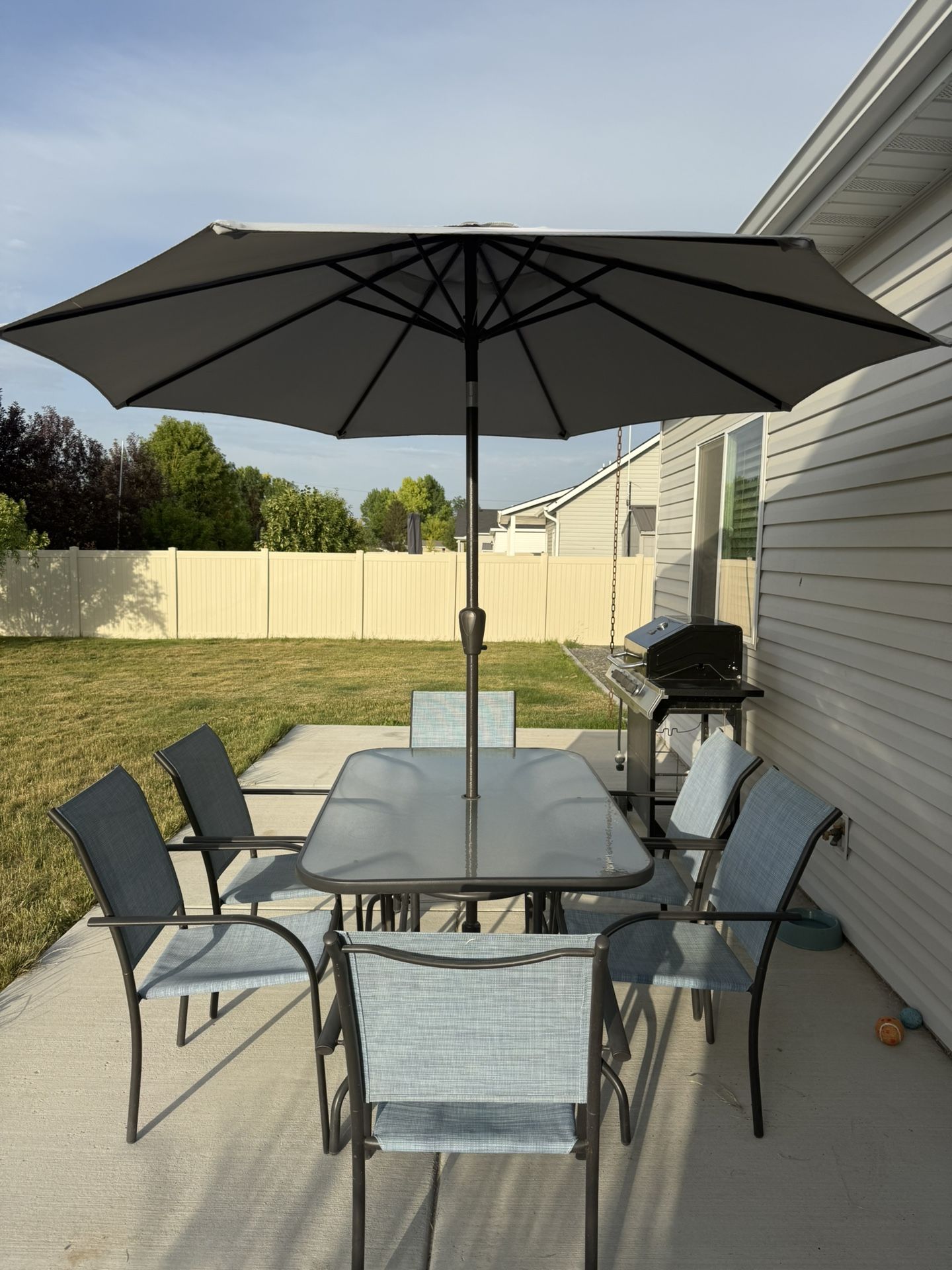 Patio Table, Chairs, and Umbrella