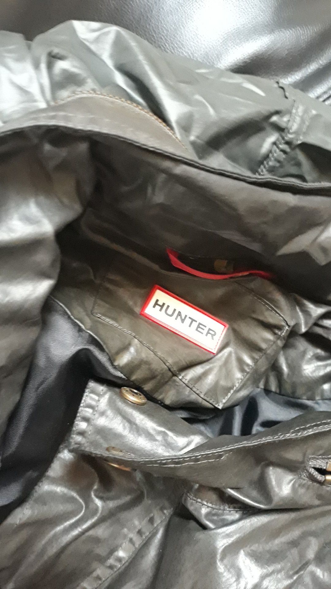 Olive green Hunter rain jacket.