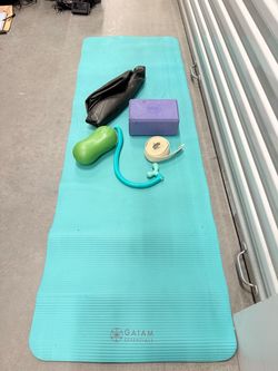 Yoga mat, strap, block, ball, and triggeri point massager