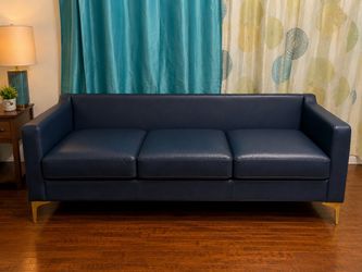 The leather blue couch
