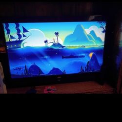 JVC 32" Flat-screen TV/ W Roku HOOKUP