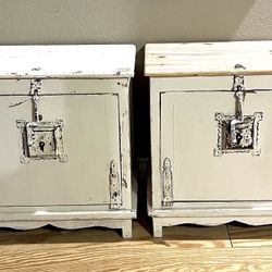 Two Distressed Beige Cabinets With Metal Latches