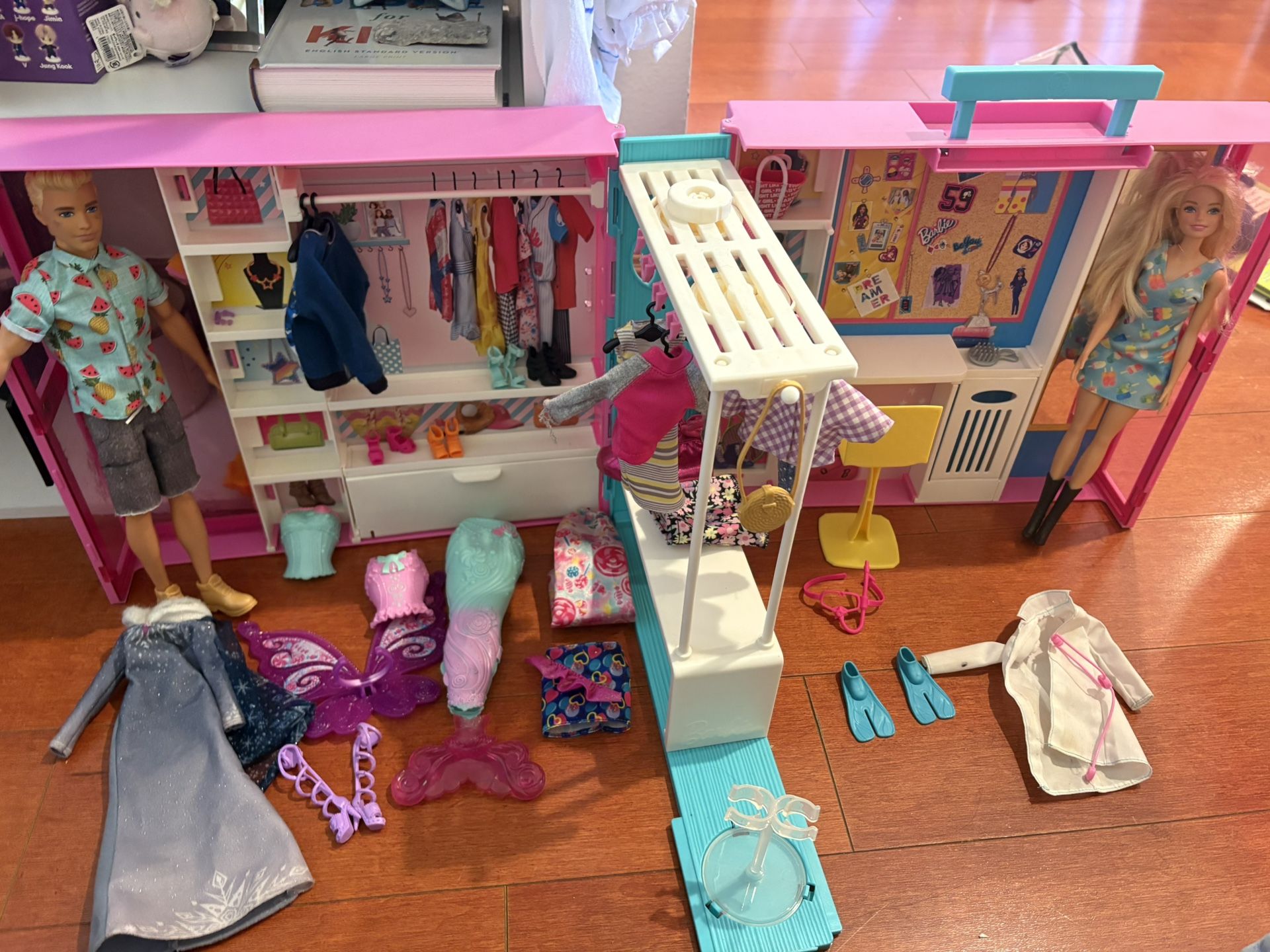 barbie closet with barbies and clothes