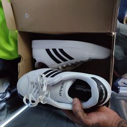 Size 14 brand new Adidas 15$
