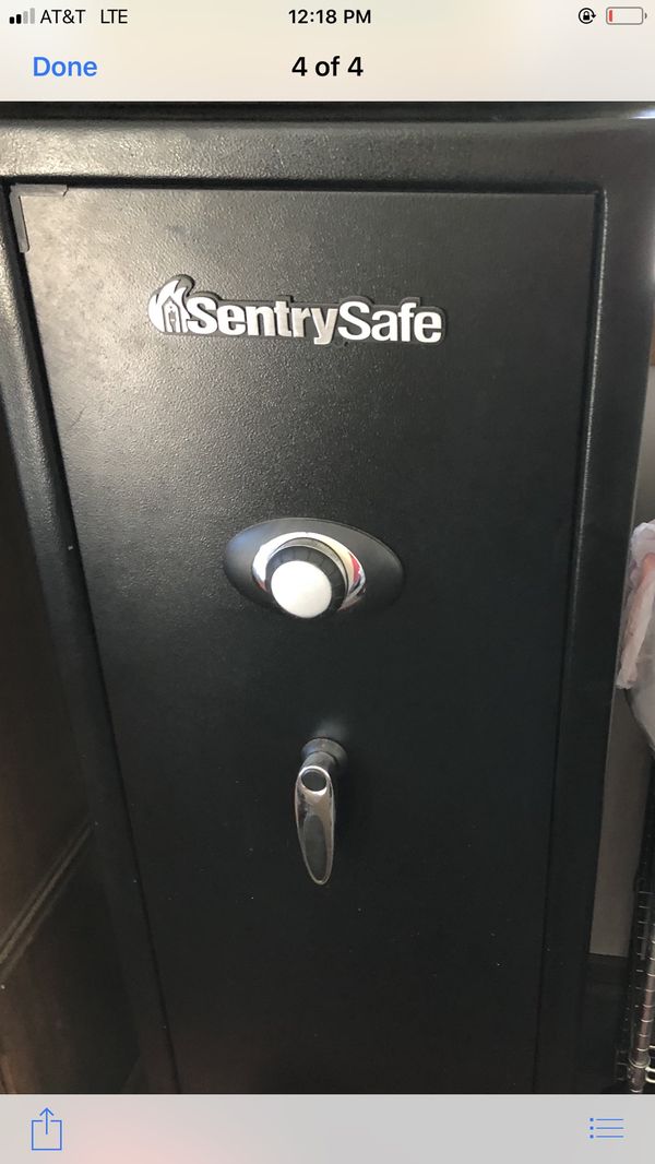 Sentry Combination Gun Safe, 14 gun safe, weighs 209lbs, height 59