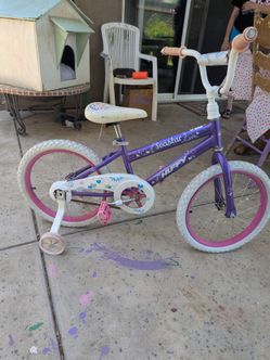 Girls bike,white and purple with training wheels