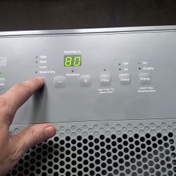 Like-New GE Gray Programmable Smart Dehumidifier And Self Draining And 20' Hose For Sale. 