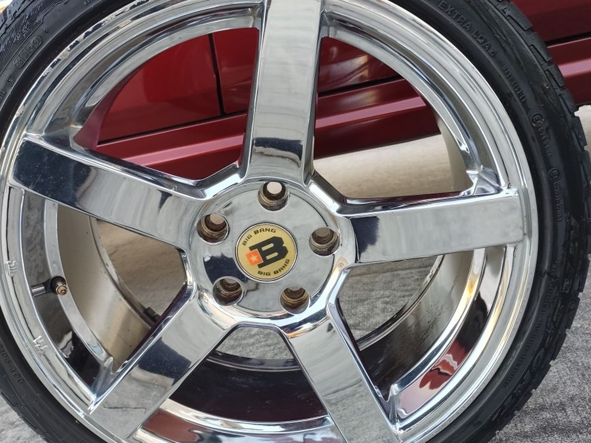 18" set of 4 chrome rims w/ tires