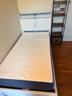 Bed and book shelf