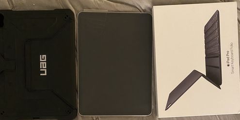 Like new iPad Pro 11” 64g WiFi with 2 cases