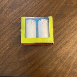 2 Porcelain salt and pepper shakers