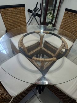 Glass round top wood wicker table and chairs