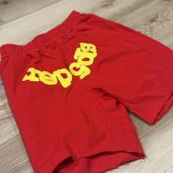 Red sp5der shorts with yellow. size medium