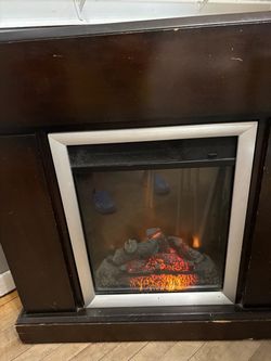 Electric Fireplace with Dark Wood Mantel