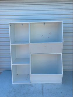 RiverRidge Home kids' toy organizer and bookcase featuring three open shelves and two large, slanted storage bins.