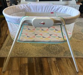 Fisher-Price portable bassinet. Vibrates.