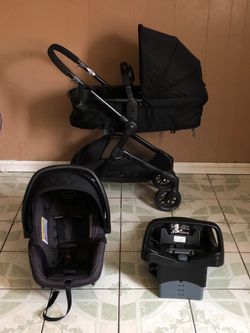 PRACTICALLY NEW EVENFLO PIVOT MODULAR TRAVEL SYSTEM STROLLER CAR SEAT AND BASSINET 3 IN 1
