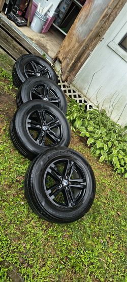Rims with  tires 255/ 65R18  Ford