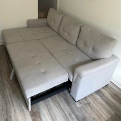 Light Gray Ashlyn 84” Reversible Sectional Sofa with Bed Pullout and Storage Chaise