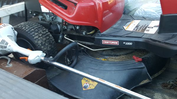 Craftsman r1000 riding mower and a stihl fs 38 weed eater