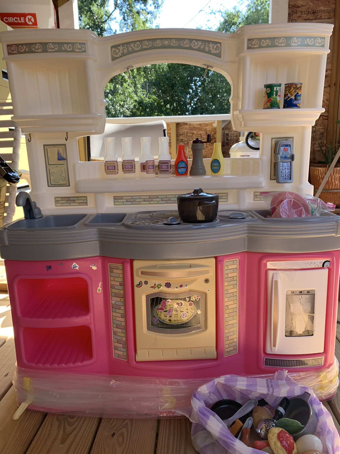 Toy kitchen with accessories