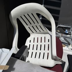 White plastic patio chair