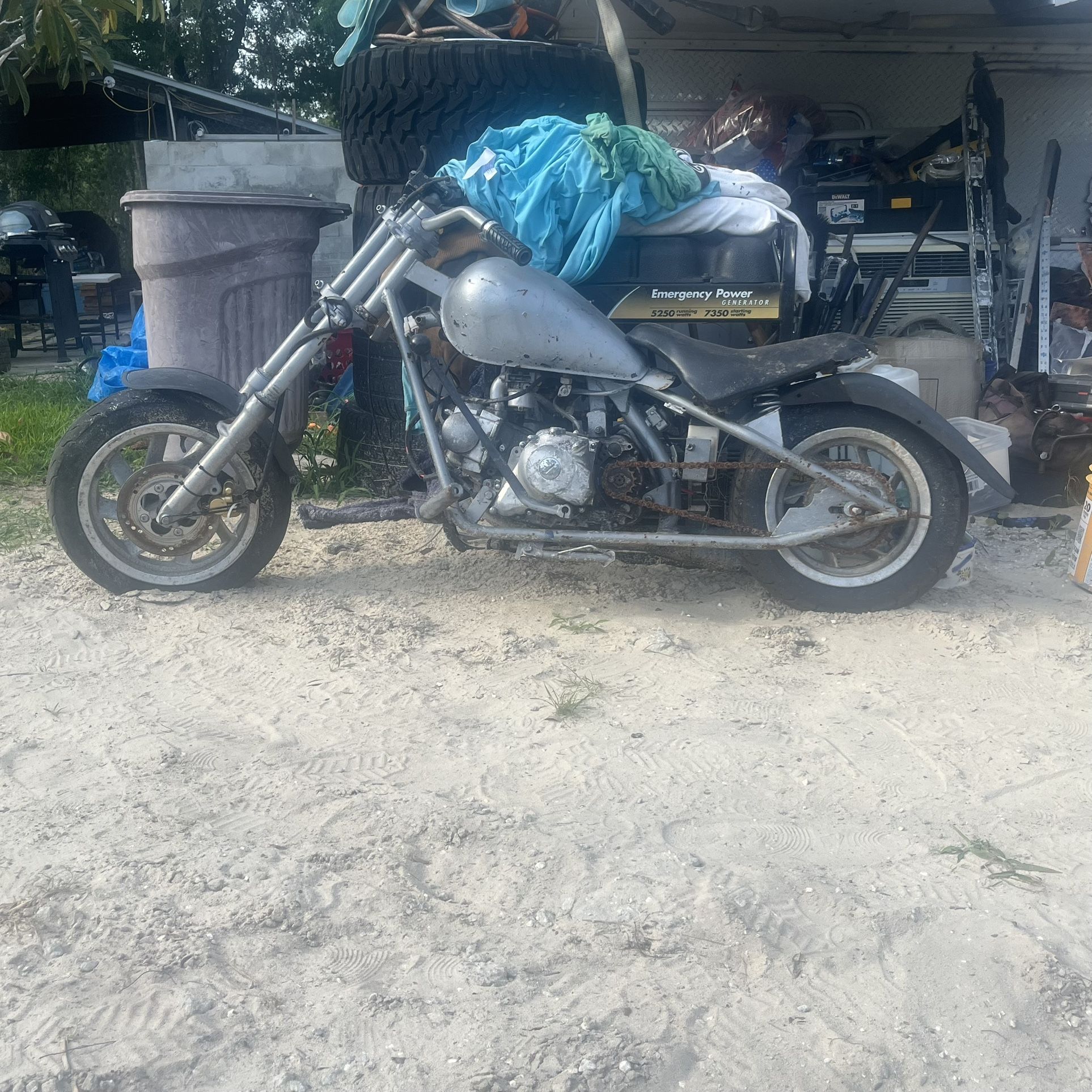 Mini chopper needs battery and gas tank clean also has a kickstart to