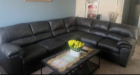 Ashley, dark grey sectional sofa and coffe table