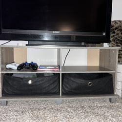 Gray  TVStand  With Black Bins  ( Tv stand 19 inches tall 38 inches wide ) 