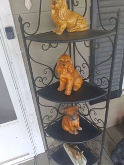 Rack with old dogs statue