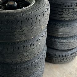Ford F150 Stocks And Black Rims Of A 2005 Nissan Titan