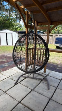 Egg shaped chair with stand