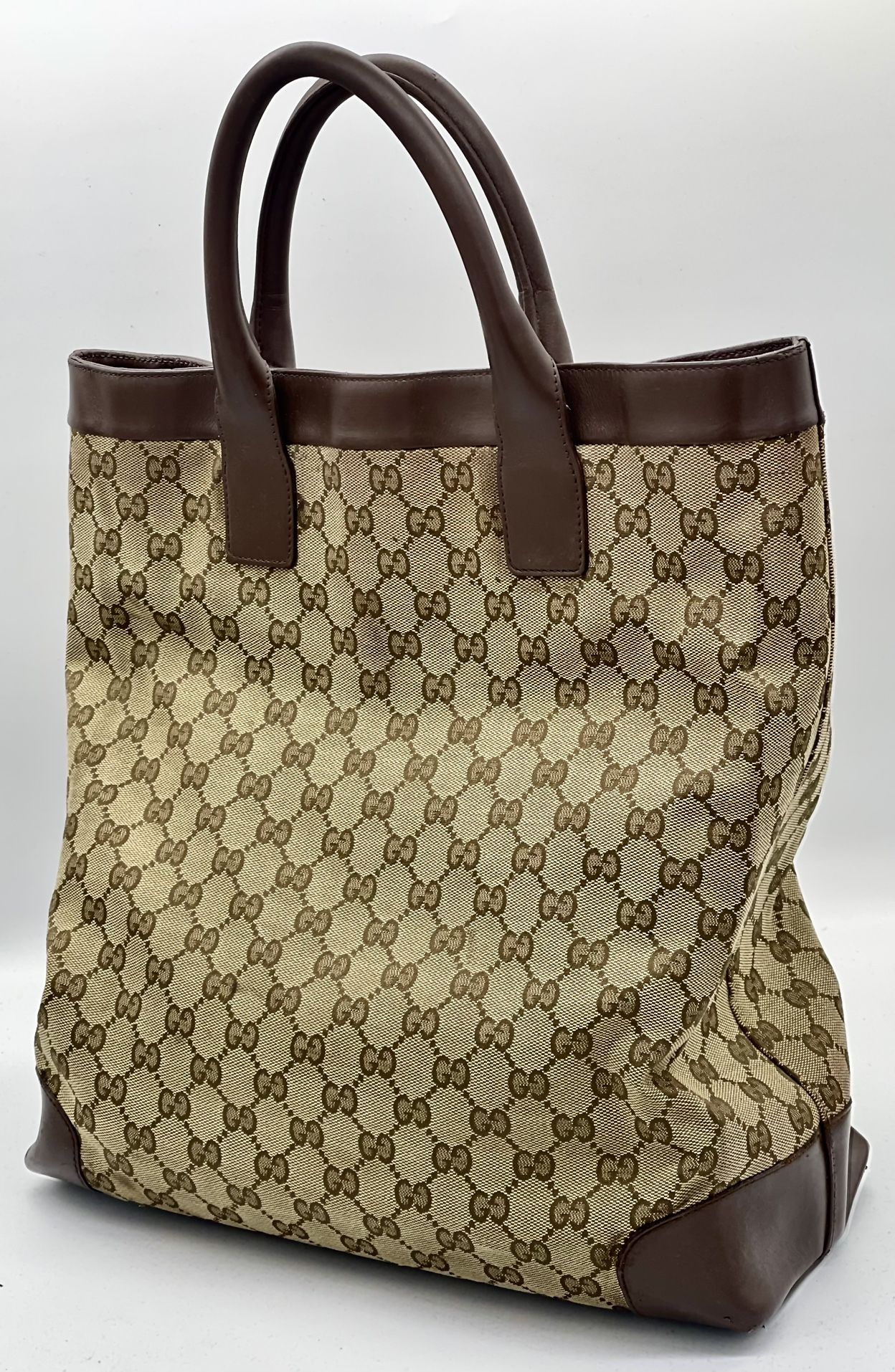 Gucci Authentic GG Tote Bag. Clean Kept. Traditional GG Logo With Leather Straps And Bottom. 100% Authentic.