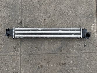 10 - 17 BMW 535i  XI engine Turbocharger Intercooler Radiator OEM